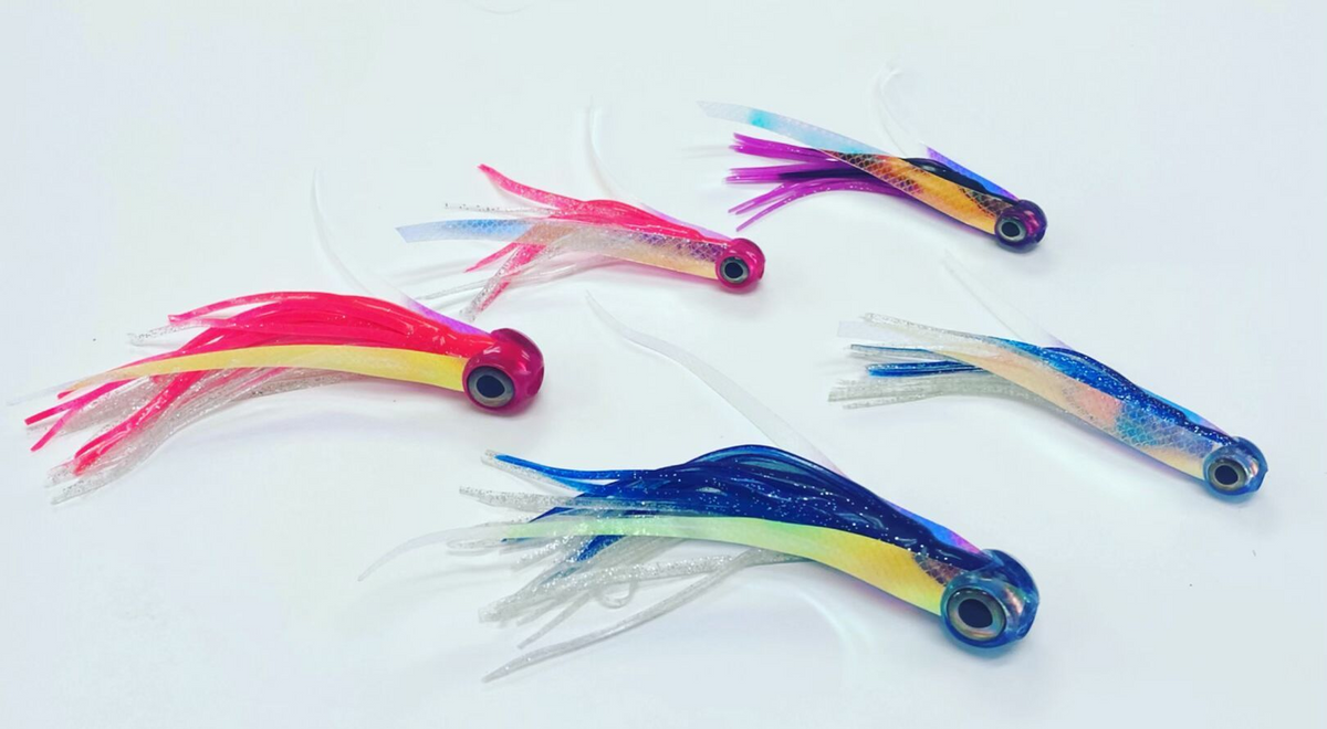 Colorful fishing lures on a white background